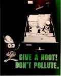 cx-0000-003.jpg - Filing cabinet with drawer full of classified information open. Cartoon owl suggests, "Give a hoot! Don't pollute."

