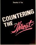 cx-15790-009.jpg - The words "Security & You - Countering the.THREAT" written in large lettering.

